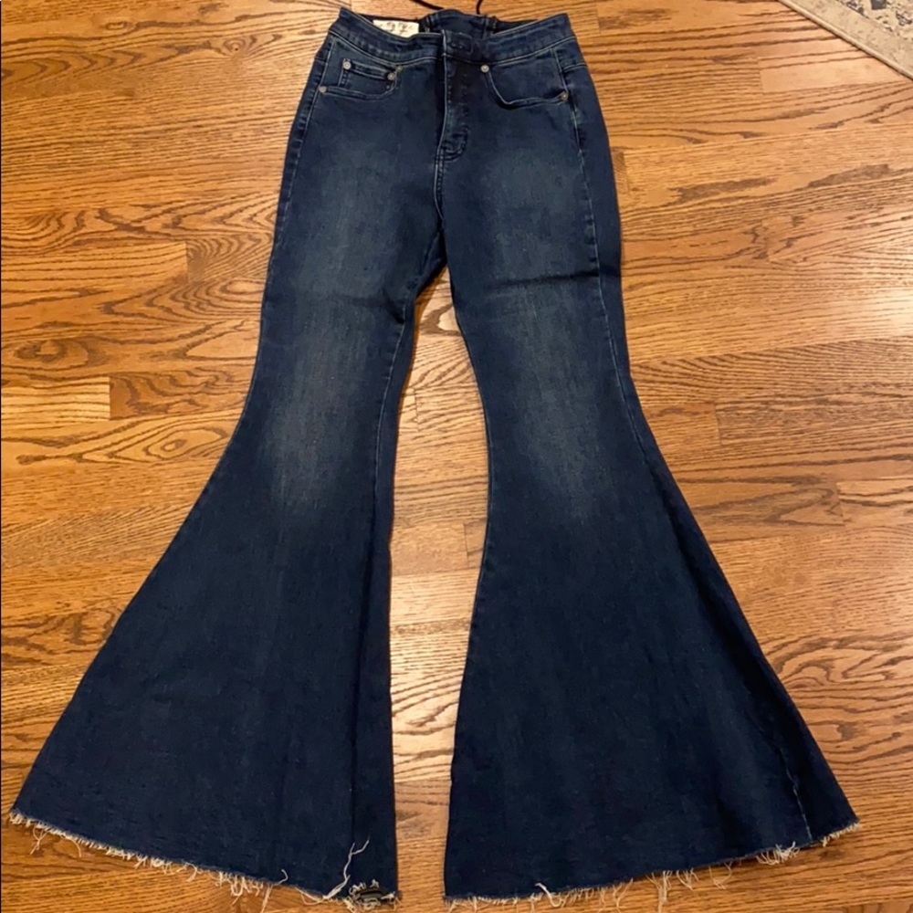 Free People flared jeans with lace up back!